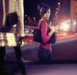 Photo: Walking woman looking at shop window Walking woman looking at shop window