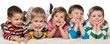 Five children lying on the carpet