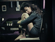Sad woman sitting on a chair