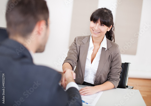 Foto: Young businesswoman at the interview Young businesswoman at the interview