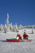 Photo: Young couple enjoying on snow, portrait Young couple enjoying on snow, portrait