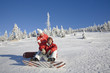 Photo: Young couple enjoying on snow Young couple enjoying on snow