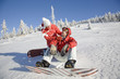 Photo: Young couple enjoying on snow Young couple enjoying on snow