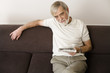 Senior man reading newspaper
