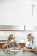Foto: Senior couple having breakfast at dinning table Senior couple having breakfast at dinning table