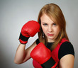Foto: beautiful strong girl in red gloves for boxing beautiful strong girl in red gloves for boxing