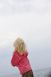 Child looking up at sky