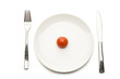 Photo: Cherry tomato on ceramic dinner plate, directly above Cherry tomato on ceramic dinner plate, directly above