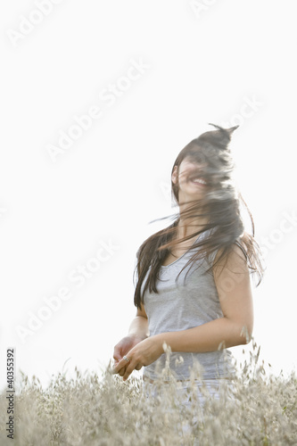 Foto: Young woman smiling Young woman smiling