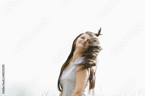 Foto: Young woman smiling Young woman smiling