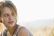 Photo: Mid adult woman smiling, close-up Mid adult woman smiling, close-up
