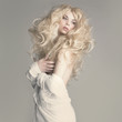 Fashion photo of beautiful woman with sexy body and blond hair
