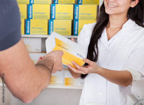 Photo: Men buying medicine at the drugstore Men buying medicine at the drugstore