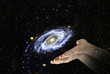 galaxy in palms.Elements of this image furnished by NASA galaxy in palms.Elements of this image furnished by NASA
