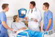 Photo: American medical team by patient's bed American medical team by patient's bed