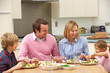 Family sharing meal together at home
