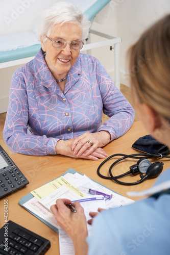 Photo: Senior woman patient with UK nurse Senior woman patient with UK nurse