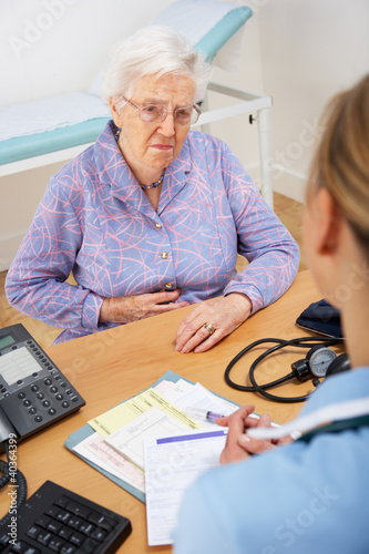 Photo: Senior woman patient with UK nurse Senior woman patient with UK nurse