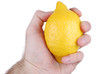lemon in a hand lemon in a hand