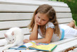 Portrait of the little girl with the book Portrait of the little girl with the book