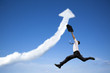 Photo: jumping businessman with business growing graph cloud jumping businessman with business growing graph cloud