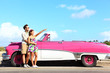 Vintage car - couple pointing Vintage car - couple pointing