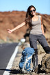Travel hitchhiker woman happy