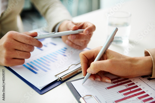 Photo: Discussing graphs Discussing graphs