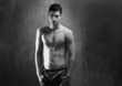Black and white sexy young denim shirtless man