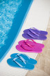 Colorful slippers by pool