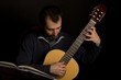 Guitar player studying Guitar player studying