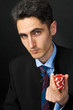 Gambler with chips in hand. Gambler with chips in hand.