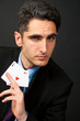 Young lucky gambler with cards Young lucky gambler with cards