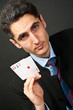 Young lucky gambler with cards Young lucky gambler with cards