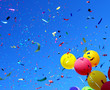 multicolored balloons and confetti