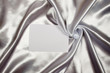 White card on silk White card on silk
