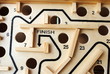 사진:write finish in a wooden labyrinth with holes on the path write finish in a wooden labyrinth with holes on the path