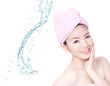사진:girl smiling touch face after shower with water background girl smiling touch face after shower with water background