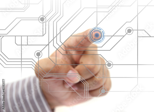 Photo: hand pushing circuit button on touch screen hand pushing circuit button on touch screen