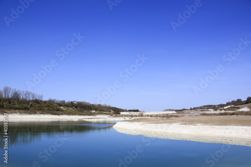 Photo: disused flooded quarry english countryside disused flooded quarry english countryside
