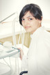 Brunette physician at workplace