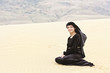 Smiling woman in desert