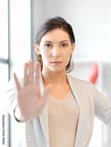 Photo: woman making stop gesture woman making stop gesture