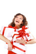 Excited attractive woman with many gift boxes and