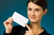 Businesswoman showing business card