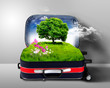 Red suitcase with green nature inside