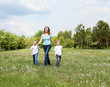 mother with her two sons outdoors