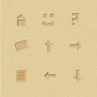 Set of interface icons on cardboard background