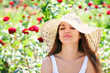 Photo: Young woman wearing sun hat Young woman wearing sun hat