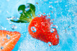 Strawberry splash in water- top view Strawberry splash in water- top view